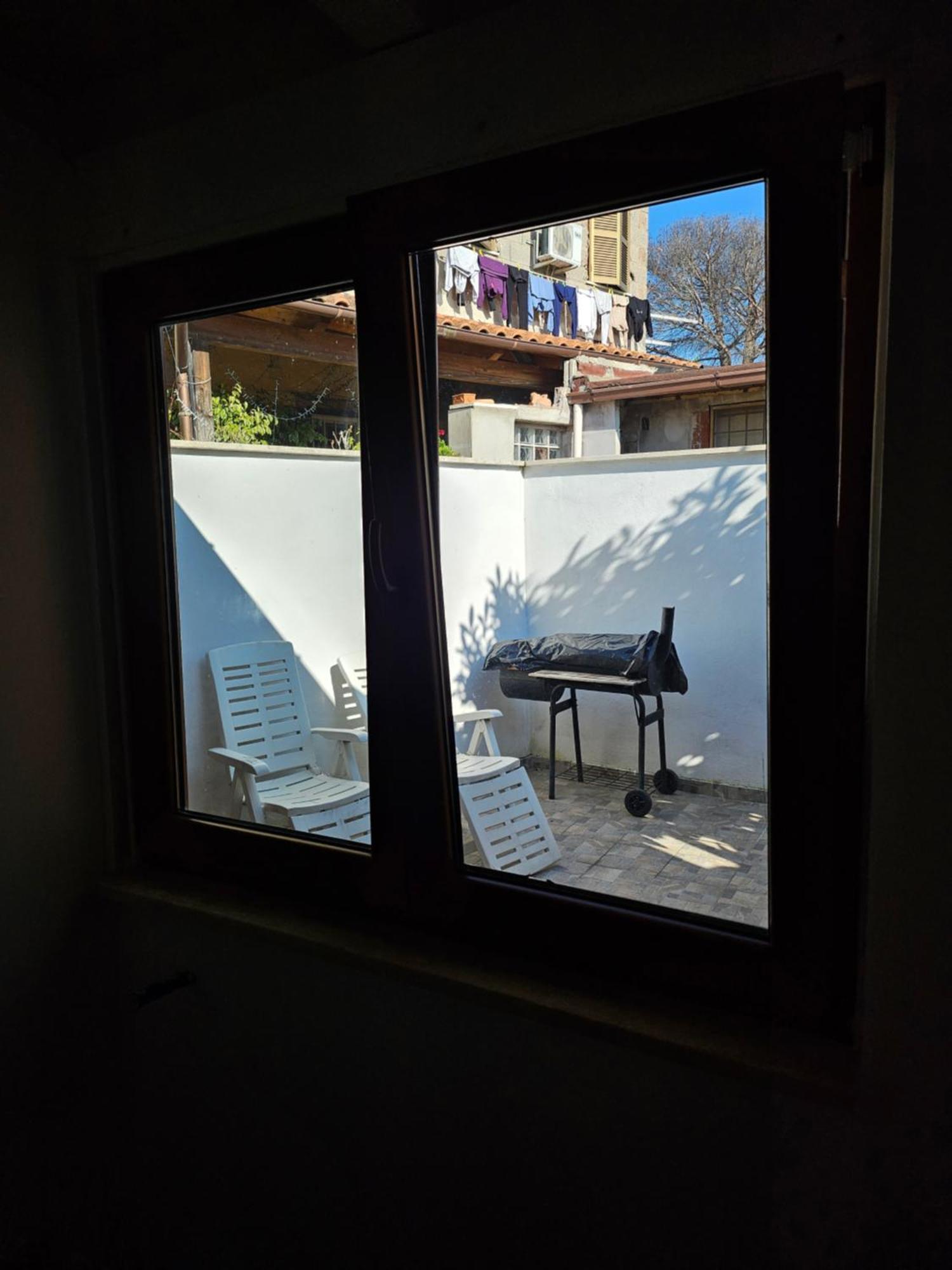 Casa Vacanze Dragona 15 Min Fco 10 Min Ostia Acilia Bilik gambar